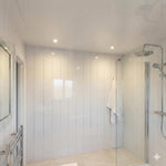 White High Gloss Wall Panel installed in a modern bathroom with walk-in shower